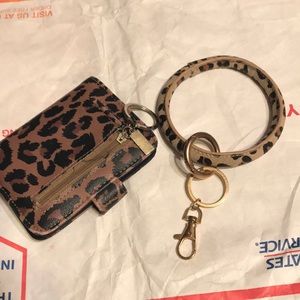 Sold. Cheetah key ring and wallet